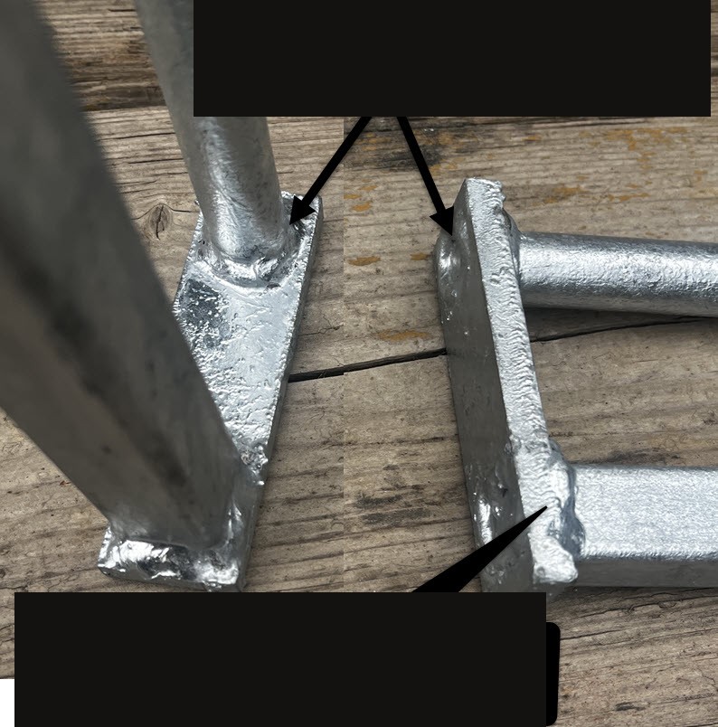 Close-up of double welds above and below the pegs on an 8 mm thick top connector